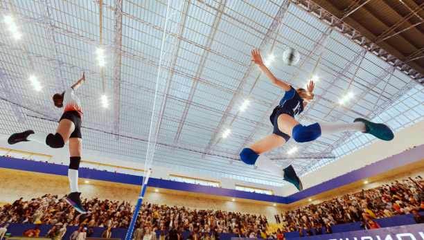 女排运动员在职业球场上行动。图片下载