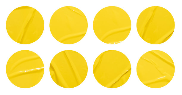 一套圆形黄色纸贴纸模拟空白标签标签，孤立在白色背景与修剪路径的设计工作图片下载