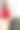 年轻美丽友好的亚洲女性女士，红色长袖毛衣和白色裙子，漂亮的发带，在镜子前摆出不同的样子，在她的房间里有一棵装饰精美的圣诞树作为背景图片下载