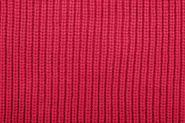 针织面料质地。展示Viva品红色- 2023年的潮流颜色背景，纹理。抽象的图案图片下载