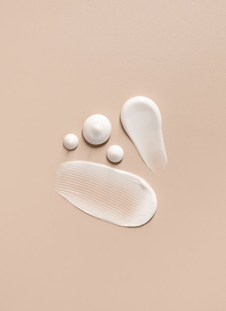 化妆品涂抹奶油纹理米色背景图片下载