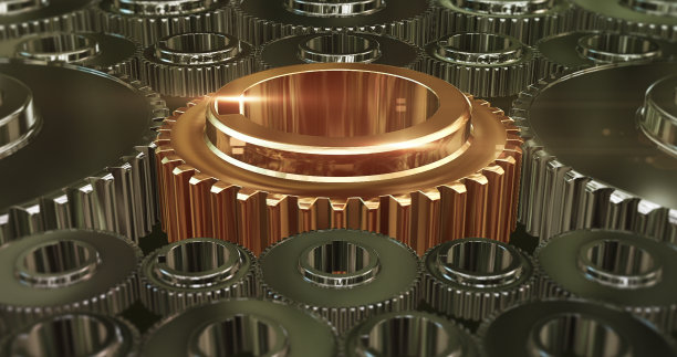 闪亮的金色齿轮慢慢旋转在中心。图片下载