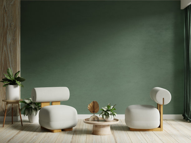 客厅灰色扶手椅在空的深绿色墙壁背景。图片下载