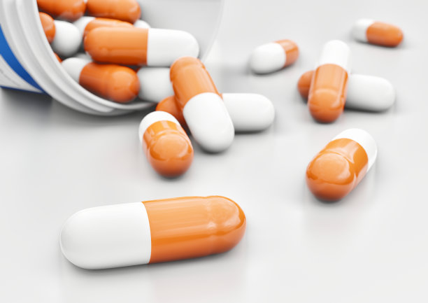 药丸从瓶子里溢出图片下载