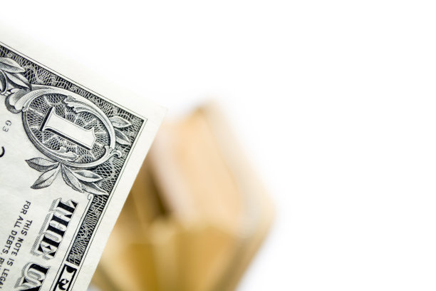 美元的边缘映衬着空空的钱包。图片下载