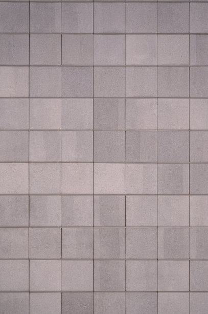 花岗岩方形墙砖的纹理。图片下载