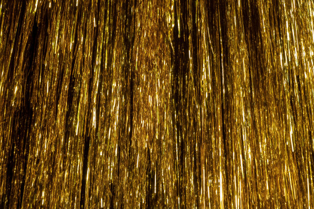 金属金箔金属丝镶边装饰窗帘。生日，婚礼，圣诞节，新年派对装饰背景图片下载