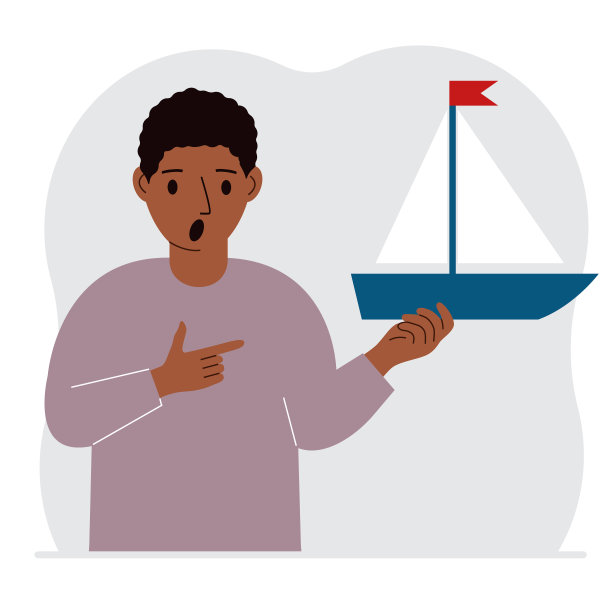 一个男人手里拿着一艘帆船。自由、希望和大计划的概念。爱好、运动或生意。图片下载