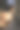 年轻男子举杠铃进行重量训练，背部肌肉特写图片下载
