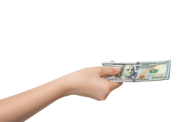 100美元钞票在一个女人手里，孤立图片下载