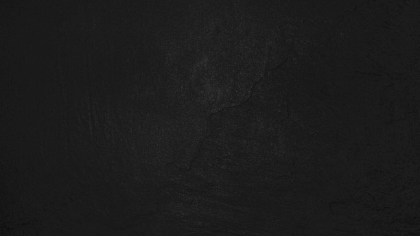 破旧的黑色裂缝墙的纹理图片下载