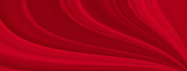 黑色红色缎面深色面料质地豪华闪亮，是抽象的丝绸布料背景与图案柔软的波浪模糊美丽。图片下载