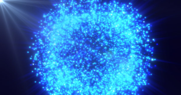 抽象的背景是一个明亮的蓝色发光球体的闪亮明亮美丽的节日烟花颗粒图片下载