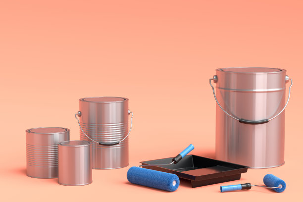 一套金属罐或桶与油漆辊和托盘在橙色的背景。图片下载