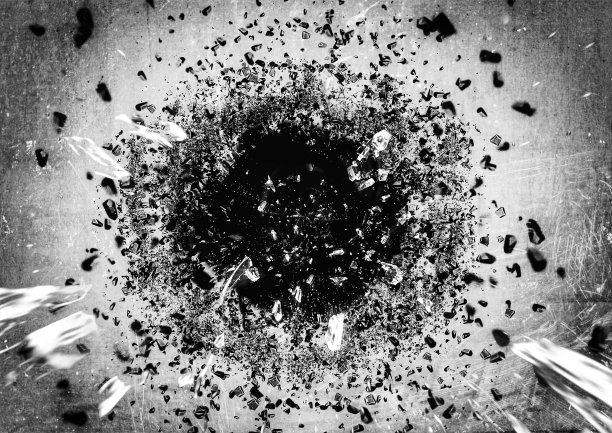 抽象背景与洞在墙上爆炸冲击破坏的概念图片下载