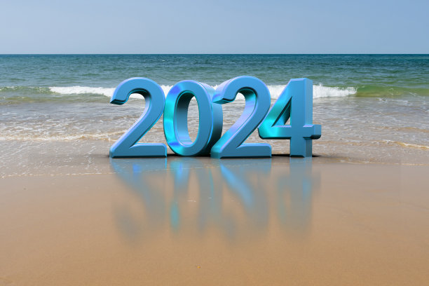 金色2024文字躺在沙滩上- 3d渲染图片下载