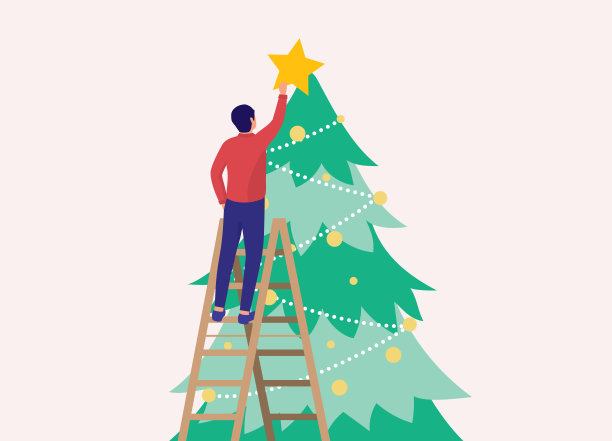 男人爬上梯子，把星星放在高高的圣诞树上。图片下载