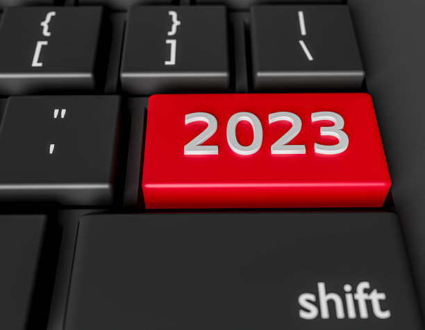 电脑键盘上的数字2023。新年图像在电脑上按Enter键图片下载