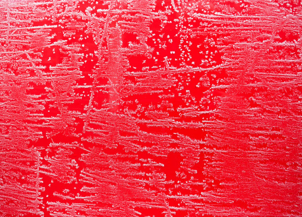 真正的白色霜在红色的背景图片下载