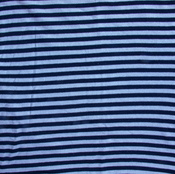 航海纺织纹理的背景。近距离的海洋纺织品纹理与蓝色和白色条纹。图片下载
