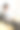 年轻漂亮的亚洲女人坐在客厅舒适的沙发上看书。图片下载