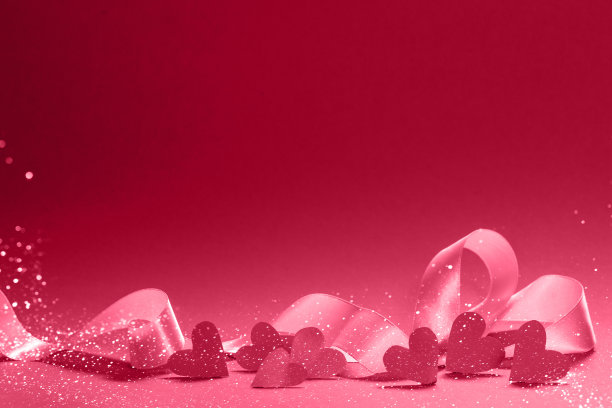 红红色的背景上有亮片。图片下载