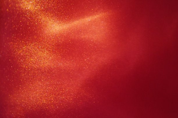 抽象的红色背景与闪闪发光的液体波和运动图片下载