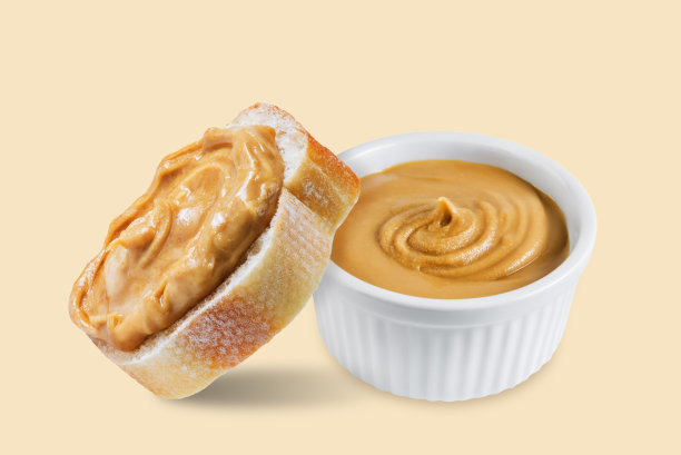 黄色背景的花生酱三明治图片下载