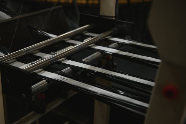 纺织工业，织造和整经线的特写图片下载