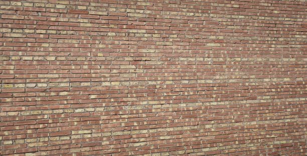 老曲线砖墙为背景。图片下载