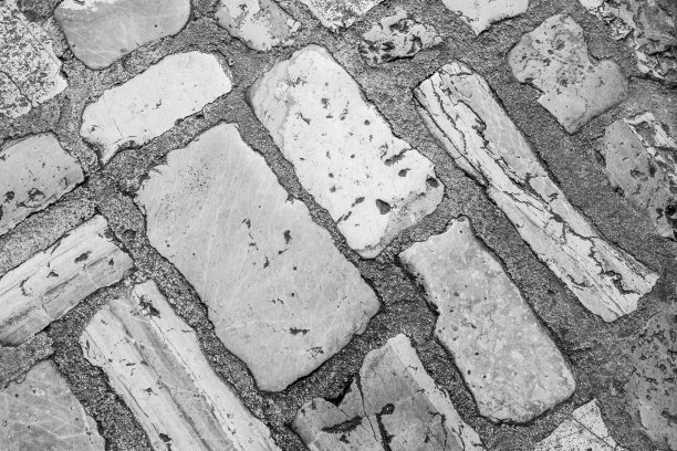 鹅卵石瓷砖街道与大石头，俯视图。古石地板纹理。旧的人行道海报，日历，帖子，屏幕保护程序，壁纸，明信片，封面，网站。高质量照片图片下载
