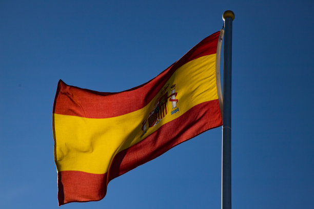 蓝色背景的西班牙国旗图片下载