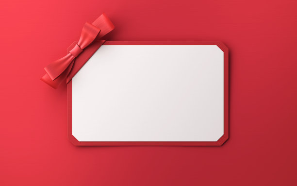 空白甜蜜礼品卡或礼券与红色缎带蝴蝶结孤立的红色背景与阴影最小概念库存照片图片下载