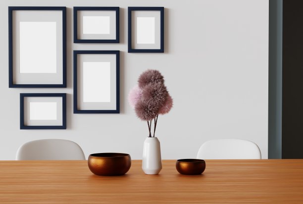 客厅的桌子和墙上的空相框。图片下载