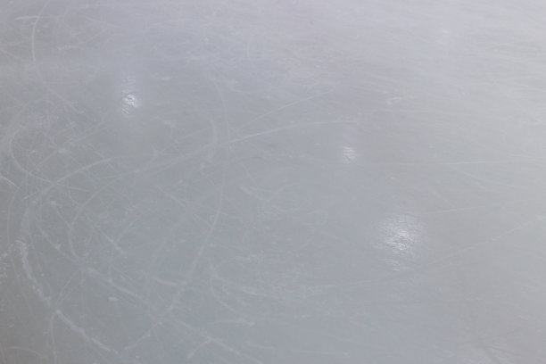 冰场地板表面背景和纹理在冬季的时候，冰球运动场地。图片下载