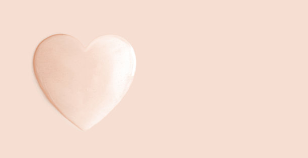 圆形透明凝胶血清滴在米色背景图片下载