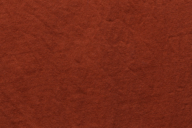 红色织物布涤纶纹理和纺织背景。图片下载