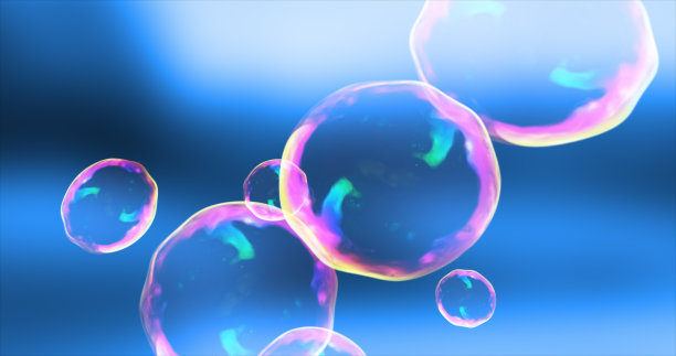 抽象透明的肥皂泡在蓝天的映衬下飞起明亮的彩虹色，美丽喜庆。抽象的背景图片下载