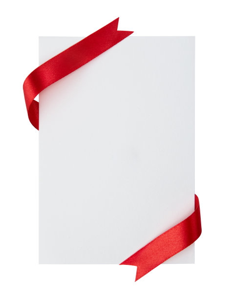 一张白色背景上带蝴蝶结的卡片的特写图片下载