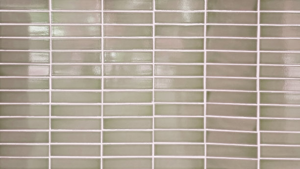 近棕色米色马赛克墙砖在极简风格。真正的古董奶油色陶瓷内墙砖。墙砖背景为现代、简单、大胆、清新、柔和、大地色调的概念。图片下载