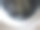 装有肥皂的前置洗衣机，洗衣衣物在里面旋转图片下载