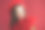 快乐的时尚女人在红色的衣服和贝雷帽的红色背景图片下载