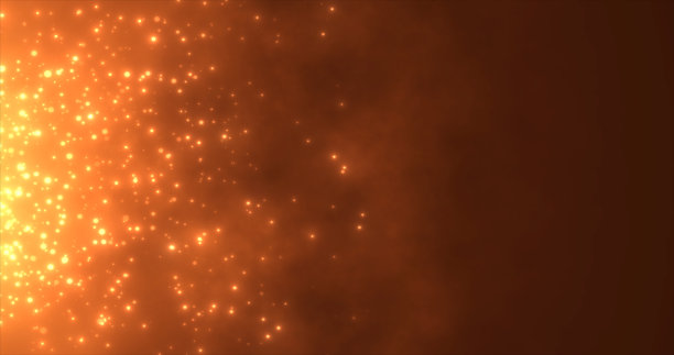 抽象的橙色火焰熊熊的粒子和火花发光美丽神奇的黑色背景。抽象的背景图片下载
