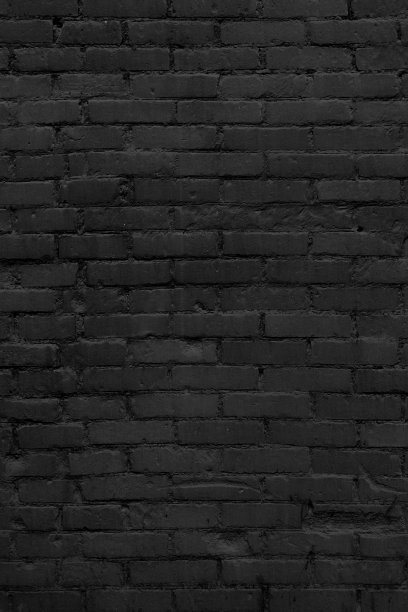 黑色的砖墙。一个现代阁楼的内部。图片下载