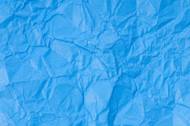 皱褶的蓝色纸张纹理背景图片下载