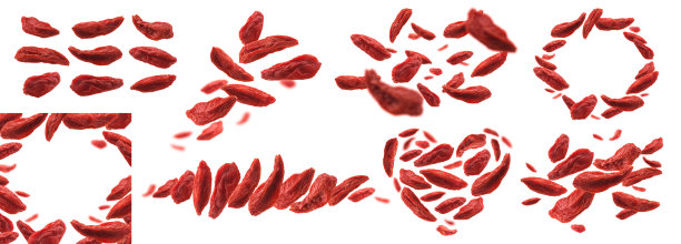 一组照片。干枸杞浆果漂浮在白色的背景上图片下载