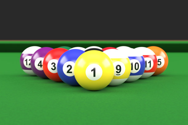 绿色台球桌上一组有数字的彩色光滑的台球图片下载