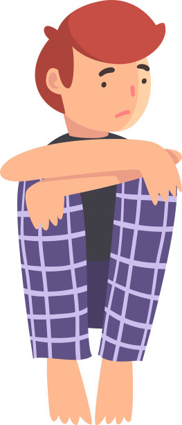 伤心难过的男孩沮丧地坐在地板上图片下载