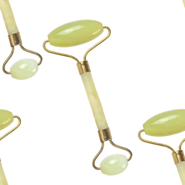 无缝图案与玉石按摩辊上的白色。图片下载