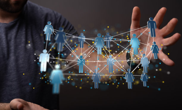 浅聚焦人手握互联的人类图标，团队联网概念图片下载